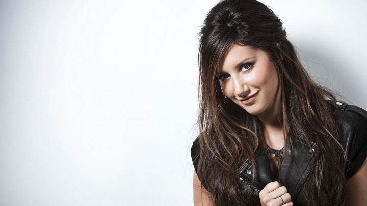 Ashley Tisdale Smiling In Black Jacket